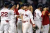 Boston Red Sox's Alex Verdugo, center, celebrates with teammates after defeating the Miami Marlins in a baseball game, Monday, June 7, 2021, in Boston. (AP Photo/Michael Dwyer)