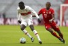 FILE - In this Saturday, March 20, 2021 file photo Stuttgart's Silas Wamangituka, left, and Bayern's David Alaba, right, challenge for the ball during the German Bundesliga soccer match between FC Bayern Munich and VfB Stuttgart in Munich, Germany. Stuttgart says that Congolese forward Silas Wamangituka has been playing under a false name and is a year older than previously thought. The player's real name is Silas Katompa Mvumpa. (Matthias Schrader/Pool via AP)