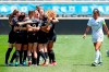 Chicago Red Stars players celebrate after scoring a goal against North Carolina Courage during the first half of a NWSL soccer match, Saturday, June 5, 2021, in Bridgeview, Ill. (AP Photo/Shafkat Anowar)