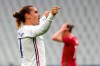 France's Antoine Griezmann, left, celebrates his goal against Bulgaria during the international friendly soccer match between France and Bulgaria at the Stade De France in Saint Denis, North of Paris, France, Tuesday, June 8, 2021. (AP Photo/Francois Mori)