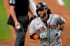 San Francisco Giants' Brandon Crawford turns to the dugout after scoring on his solo home run during the sixth inning of a baseball game against the Texas Rangers in Arlington, Texas, Tuesday, June 8, 2021. (AP Photo/Tony Gutierrez)