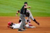 Texas Rangers' Adolis Garcia calls for time, San Francisco Giants' Brandon Crawford keeps the tag on and umpire Lance Barksdale calls Garcia out in the ninth inning of a baseball game in Arlington, Texas, Wednesday, June 9, 2021. The play was upheld after a video review. (AP Photo/Tony Gutierrez)