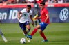 United States Tyler Adams, left, battles against Costa Rica's Bernald Alfaro, right, in the first half during an international friendly soccer match Wednesday, June 9, 2021, in Sandy, Utah. (AP Photo/Rick Bowmer)