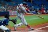 Washington Nationals' Ryan Zimmerman (11) connects for a two-run home run off Tampa Bay Rays relief pitcher Jeffrey Springs during the fifth inning of a baseball game Wednesday, June 9, 2021, in St. Petersburg, Fla. (AP Photo/Chris O'Meara)