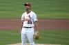 St. Louis Cardinals starting pitcher Adam Wainwright reacts after hitting Cincinnati Reds' Tyler Naquin with pitch while the bases were loaded to score Jesse Winker during the first inning of a baseball game Thursday, June 3, 2021, in St. Louis. (AP Photo/Jeff Roberson)