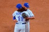 Toronto Blue Jays' Bo Bichette (11) and Marcus Semien celebrate the team's 6-2 win over the Chicago White Sox in a baseball game Wednesday, June 9, 2021, in Chicago. (AP Photo/Charles Rex Arbogast)