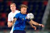 Italy's Ciro Immobile, right, is challenged by Czech Republic's David Zima during the international friendly soccer match between Italy and Czech Republic in Bologna, Italy, Friday, June 4, 2021. (AP Photo/Antonio Calanni)