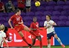 Canada defender Vanessa Gilles (23) heads the ball in front of forward Nichelle Prince (15) and United States forward Carli Lloyd (10) during the first half of a SheBelieves Cup women's soccer match in Orlando, Fla., on February 18, 2021. THE CANADIAN PRESS/AP, Phelan M. Ebenhack