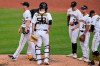 Pittsburgh Pirates starting pitcher Mitch Keller, left, walks off the mound after handing the ball to manager Derek Shelton, rear, during the third inning of a baseball game against the Los Angeles Dodgers in Pittsburgh, Thursday, June 10, 2021. (AP Photo/Gene J. Puskar)