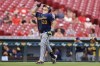 Milwaukee Brewers' Daniel Vogelbach reacts as he runs the bases after hitting a two-run home run during the seventh inning of a baseball game against the Cincinnati Reds in Cincinnati, Thursday, June 10, 2021. (AP Photo/Aaron Doster)