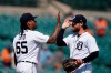 Detroit Tigers relief pitcher Gregory Soto (65) greets left fielder Eric Haase after the team's 8-3 win over the Seattle Mariners in a baseball game, Thursday, June 10, 2021, in Detroit. (AP Photo/Carlos Osorio)