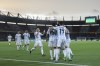 Payers of Argentina celebrate their second goal against Colombia, scored by Leandro Paredes, during a qualifying soccer match for the FIFA World Cup Qatar 2022 at the Metropolitano stadium in Barranquilla, Colombia, Tuesday, June 8, 2021. (AP Photo/Fernando Vergara)