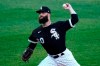 Chicago White Sox starting pitcher Dallas Keuchel throws to a Toronto Blue Jays batter during the first inning of a baseball game in Chicago, Thursday, June 10, 2021. (AP Photo/Nam Y. Huh)