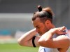 Wales' Gareth Bale gestures, during a practice session of the national soccer team of Wales, in Baku, Azerbaijan, Wednesday, June 9, 2021. The Euro 2020 gets underway on Friday June 11 and is being played in 11 host cities across 11 countries. The event was delayed by one year after being postponed in 2020 due to the COVID-19 pandemic. (AP Photo/Darko Vojinovic)