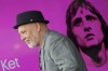 Director and writer Tom de Ket passes a screen with a picture of Johan Cruyff, during a presentation of 