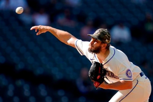 Seattle Mariners relief pitcher Kendall Graveman throws against the Cleveland Indians in the ninth inning of a baseball game Sunday, May 16, 2021, in Seattle. (AP Photo/Elaine Thompson)