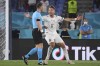 Italy's Ciro Immobile, right, argues with referee Danny Makkelie as he appeals for a penalty during the Euro 2020 soccer championship group A match between Italy and Turkey at the Olympic stadium in Rome, Friday, June 11, 2021. (Alberto Lingria/Pool Photo via AP)