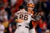 San Francisco Giants starting pitcher Anthony DeSclafani (26) and catcher Buster Posey, right, celebrate after a baseball game against the Washington Nationals, Friday, June 11, 2021, in Washington. DeSclafani threw a two-hitter as the Giants won 1-0. (AP Photo/Nick Wass)
