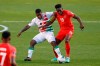 Canada's Alphonso Davies (19) and Suriname's Nigel Hasselbaink (9) work for the ball during the first half of a World Cup 2022 Group B qualifying soccer match Tuesday, June 8, 2021, in Bridgeview, Ill. Canada faces its toughest test in the current round of World Cup qualifying when it takes on No. 83 Haiti in the first leg of a home-and-away second-round playoff. nbsp;THE CANADIAN PRESS/AP/Kamil Krzaczynski