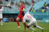 Wales' Gareth Bale, left, and Switzerland's Manuel Akanji go for the ball during the Euro 2020 soccer championship group A match between Wales and Switzerland, at the Baku Olympic stadium, in Baku, Azerbaijan, Saturday, June 12, 2021. (AP Photo/Darko Vojinovic, Pool)