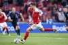 Denmark's Pierre-Emile Hojbjerg shoots and fails to score from the penalty spot during the Euro 2020 soccer championship group B match between Denmark and Finland at Parken Stadium in Copenhagen, Saturday, June 12, 2021. (Stuart Franklin/Pool via AP)