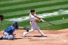 Oakland Athletics' Matt Chapman, right, hits a two-run double in front of Kansas City Royals catcher Cam Gallagher during the second inning of a baseball game in Oakland, Calif., Saturday, June 12, 2021. (AP Photo/Jeff Chiu)