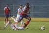 Haiti's Frantzdy Pierrot (20) races to the ball past Canada's Stephen Eustaquio during a CONCACAF World Cup qualifying soccer match in Port-au-Prince, Haiti, Saturday, June 12, 2021. (AP Photo/Joseph Odelyn)
