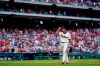 Philadelphia Phillies pitcher Aaron Nola tips his hat after being pulled in eighth inning of a baseball game against the New York Yankees, Sunday, June 13, 2021, in Philadelphia. (AP Photo/Matt Slocum)