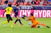 U.S. forward Carli Lloyd kicks the ball past Jamaica goalkeeper Chinyelu Asher (7) to score during the first half of their 2021 WNT Summer Series soccer match, Sunday, June 13, 2021, in Houston. (AP Photo/Michael Wyke)