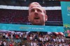 England fans stand for the anthem before the Euro 2020 soccer championship group D match between England and Croatia at Wembley stadium in London, Sunday, June 13, 2021. (Glyn Kirk/Pool Photo via AP)