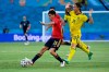 Spain's Pedri, left, challenges for the ball with Sweden's Kristoffer Olsson during the Euro 2020 soccer championship group E match between Spain and Sweden at La Cartuja stadium in Seville, Monday, June 14, 2021. (AP Photo/Pierre Philippe Marcou, Pool)