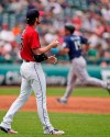 Cleveland Indians starting pitcher Shane Bieber, left, waits for Seattle Mariners' Kyle Seager to run the bases after Seager hit a solo home run in the third inning of a baseball game, Sunday, June 13, 2021, in Cleveland. (AP Photo/Tony Dejak)