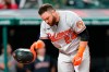 Baltimore Orioles' DJ Stewart drops his helmet after striking out in the eighth inning of a baseball game against the Cleveland Indians, Monday, June 14, 2021, in Cleveland. (AP Photo/Tony Dejak)