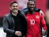 Canada head coach John Herdman, left, and David Junior Hoilett walk off the field after the first half of a CONCACAF Nations League qualifying soccer match against French Guiana in Vancouver, on Sunday March 24, 2019. THE CANADIAN PRESS/Darryl Dyck