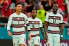 Portugal's Cristiano Ronaldo celebrates with his teammates Renato Sanches and Danilo Pereira after scoring his side's third goal during the Euro 2020 soccer championship group F match between Hungary and Portugal at the Ferenc Puskas stadium in Budapest, Hungary Tuesday, June 15, 2021. (AP Photo/Darko Bandic, Pool)