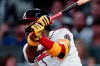 Atlanta Braves' Ronald Acuna Jr. watches his two-run double during the fourth inning of the team's baseball game against the Boston Red Sox on Tuesday, June 15, 2021, in Atlanta. (AP Photo/John Bazemore)