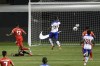 Canada's Cyle Larin (17) scores past Haiti's Josue Duverger, bottom left, during the second half of a World Cup qualifying soccer match Tuesday, June 15, 2021, in Bridgeview, Ill. (AP Photo/Kamil Krzaczynski)