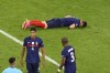 France's Benjamin Pavard lies on the pitch after Germany's Robin Gosens hit him with his knee during the Euro 2020 soccer championship group F match between France and Germany at the Allianz Arena stadium in Munich, Tuesday, June 15, 2021. (AP Photo/Alexander Hassenstein, Pool)