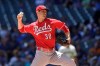 Cincinnati Reds starting pitcher Tyler Mahle throws to the Milwaukee Brewers during the first inning of a baseball game Wednesday, June 16, 2021, in Milwaukee. (AP Photo/Jeffrey Phelps)