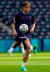 Croatia's Luka Modric controls the ball during a training session at the Hampden Park Stadium in Glasgow, Thursday, June 17, 2021, the day before their group D Euro 2020 match against Czech Republic. (AP Photo/Petr David Josek)