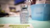 A vial of AstraZeneca vaccine is seen at a mass COVID-19 vaccination clinic in Calgary, Alta., Thursday, April 22, 2021. The website for a Broadway theatre showing 