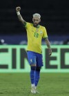 Brazil's Neymar celebrates after scoring his side's 2nd goal during a Copa America soccer match against Peru at Nilton Santos stadium in Rio de Janeiro, Brazil, Thursday, June 17, 2021.(AP Photo/Silvia Izquierdo)
