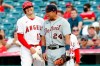 Los Angeles Angels' Shohei Ohtani, left, laughs with Detroit Tigers first baseman Miguel Cabrera at first during the first inning of a baseball game in Anaheim, Calif., Thursday, June 17, 2021. (AP Photo/Alex Gallardo)