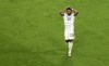 Germany's Serge Gnabry reacts after he failed to score during the Euro 2020 soccer championship group F match between France and Germany at the Allianz Arena stadium in Munich, Tuesday, June 15, 2021. (AP Photo/Alexander Hassenstein, Pool)
