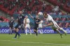 England's Harry Kane heads the ball during the Euro 2020 soccer championship group D match between England and Scotland at Wembley stadium in London, Friday, June 18, 2021. (Carl Recine /Pool Photo via AP)