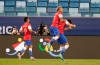 Chile's Ben Brereton, right, celebrates with teammates after scoring his side's opening goal against Bolivia during a Copa America soccer match at Arena Pantanal stadium in Cuiaba, Brazil, Friday, June 18, 2021. (AP Photo/Andre Penner)