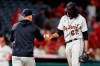 Detroit Tigers starting pitcher Jose Urena, right, gives the ball to manager A.J. Hinch after the Los Angeles Angels had scored five runs during the fifth inning of a baseball game in Anaheim, Calif., Friday, June 18, 2021. (AP Photo/Alex Gallardo)