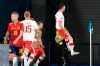 Poland's Robert Lewandowski, right, celebrates after scoring his side's first goal past Spain's goalkeeper Unai Simon, left, during the Euro 2020 soccer championship group E match between Spain and Poland at La Cartuja stadium in Seville, Spain, Saturday, June 19, 2021. (AP Photo/Thanassis Stavrakis, Pool)