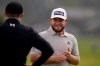 Tyrrell Hatton, right, laughs with Matt Fitzpatrick, of England, on the first green during the first round of the U.S. Open Golf Championship, Thursday, June 17, 2021, at Torrey Pines Golf Course in San Diego. (AP Photo/Gregory Bull)