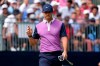 Rory McIlroy, of Northern Ireland, acknowledges the gallery after making his putt on the 18th green during the third round of the U.S. Open Golf Championship, Saturday, June 19, 2021, at Torrey Pines Golf Course in San Diego. (AP Photo/Marcio Jose Sanchez)